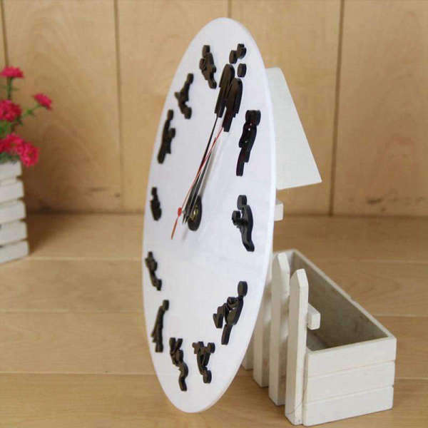 Klasické nástěnné hodiny motiv Kámasútra