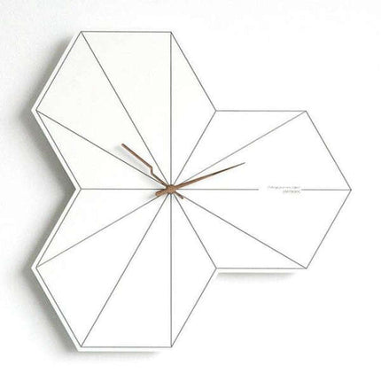 Bílé geometrické nástěnné hodiny hexagon