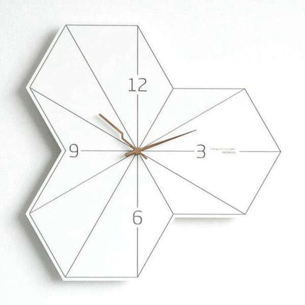Bílé geometrické nástěnné hodiny hexagon