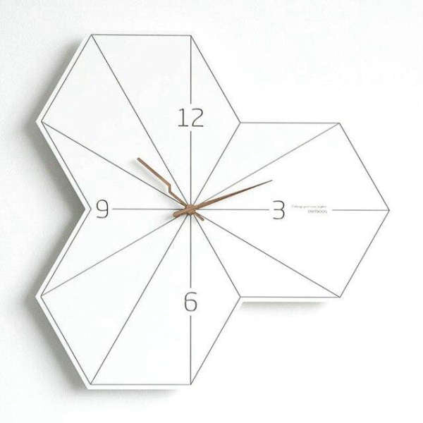 Bílé geometrické nástěnné hodiny hexagon