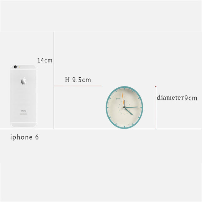 Minimalistické kulaté stolní hodiny bez číslic