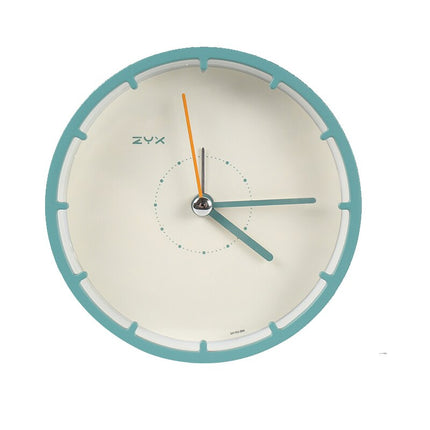 Minimalistické kulaté stolní hodiny bez číslic