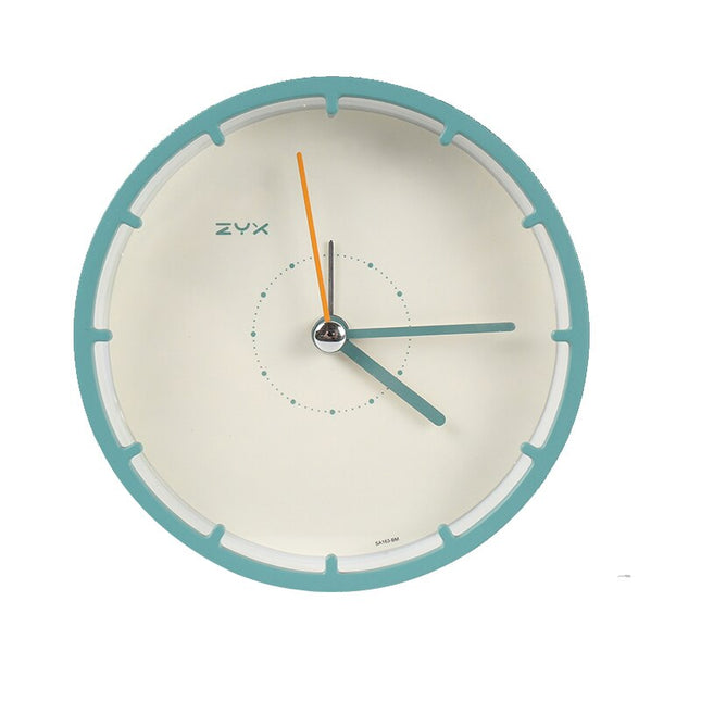 Minimalistické kulaté stolní hodiny bez číslic