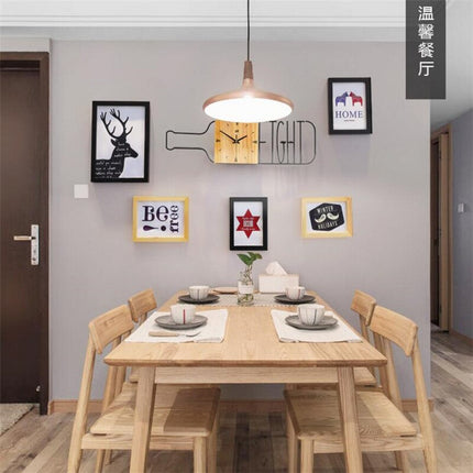 Designové nástěnné hodiny tvar láhve