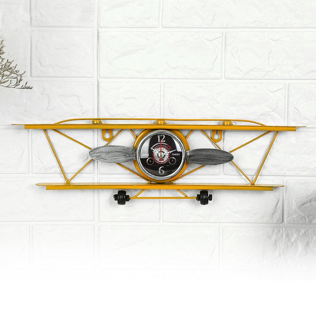 Kovové dětské hodiny ve tvaru letadla